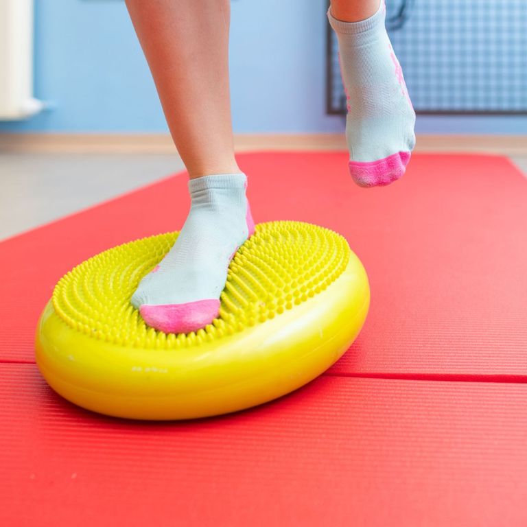 Person auf einem Balancepad